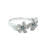 Three Plumeria Ring in White Gold with Blue Diamonds