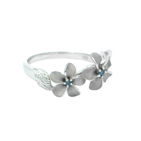 Three Plumeria Ring in White Gold with Blue Diamonds
