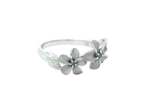 Three Plumeria Ring in White Gold with Blue Diamonds