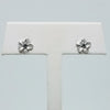 White Gold Plumeria Stud Earrings with Blue Diamonds